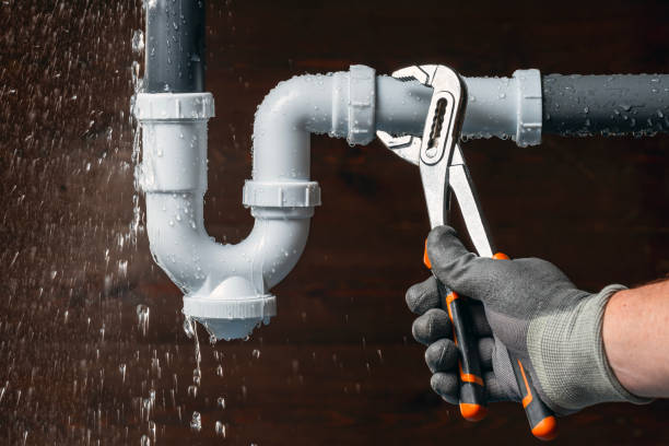 Professional Plumbing technician working in Russell, AR